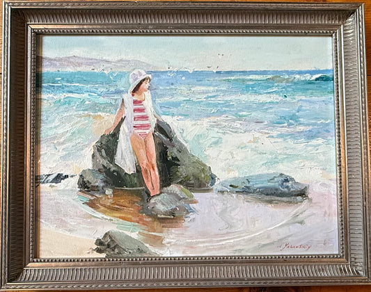 Girl at the beach painting